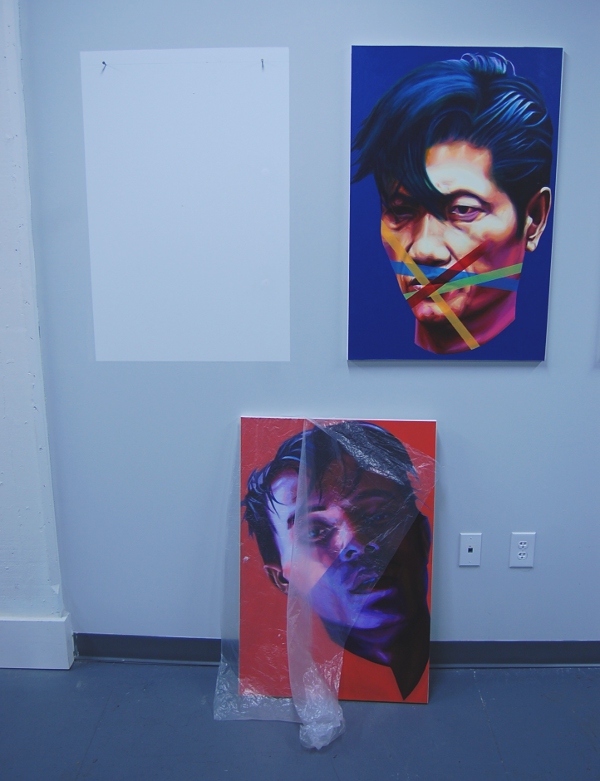Hanging and "removed" artwork from the "Censored" series by Kien Nguyen.
