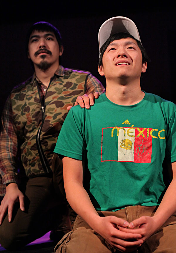 Saikong Yang as Dad, Maxwell Chonk Thao as Pao. Photo: Keri Pickett, courtesy of Mu Performing Arts.