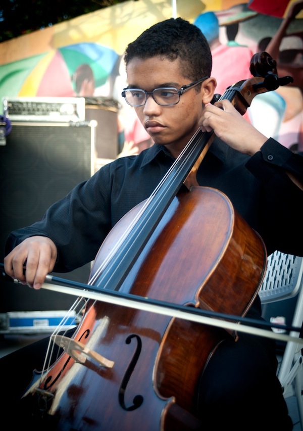 Luc-Olivier Vaval, a young cellist who attends New World School of the Arts, played a Bach Cello Suite. Photo by Luis Olazabal