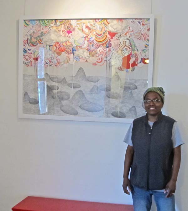 Owner/director Yvette Rock with one of Jofre's large-scale works.