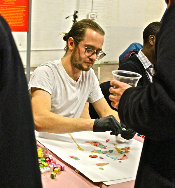 Artist Jonathan Rajewski garnered crowd participation, asking attendees to chew gum for use in his piece.