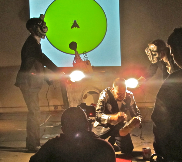 Butterfield (left), participating in a performance by Cabaret Black Eye during the MOCAD's Brain Frame event.