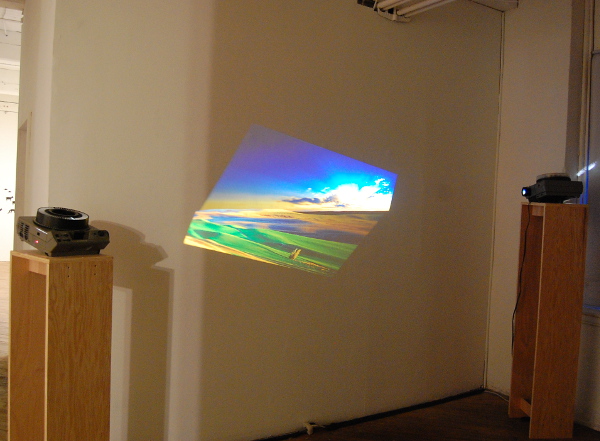 Maria Dumlao, view from the rear of "Expanded Earthly Worlds" with dual projectors.