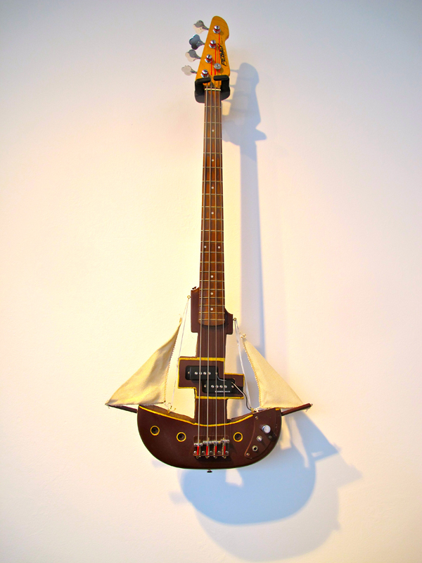 Geoff Burkhart says of his work, "Bass Guitar": "boatbassboatbassboatbassboatbassboatbass"