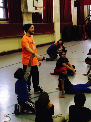 BalletX dancer Colby Damon with students from Andrew Jackson Elementary in South Philadelphia.