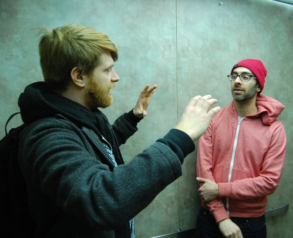 Kyle Pulley and Lee Tusman discuss the final setup for "Really Good Elevator Music."