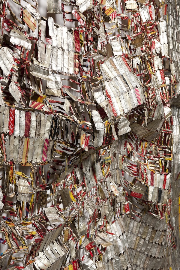 El Anatsui, Ozone Layer (detail), 2010, aluminum and copper wire, 165 3/8 x 212 5/8 inches. Courtesy of the artist and Jack Shainman Gallery, New York. Photo by Kazuo Fukunaga. Courtesy of National Museum of Ethnology, Osaka; The Museum of Modern Art, Kamakura and Hayama; The Museum of Modern Art, Saitama; The Yomiori Shimbun and the Japan Association of Art Museums.