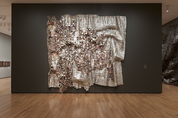 El Anatsui, Ozone Layer, 2010, Aluminum and copper wire, 158 x 197 inches, Installation at the Akron Art Museum, Courtesy of the artist and Jack Shainman Gallery, New York. Photo by Andrew McAllister. Courtesy of the Akron Art Museum.