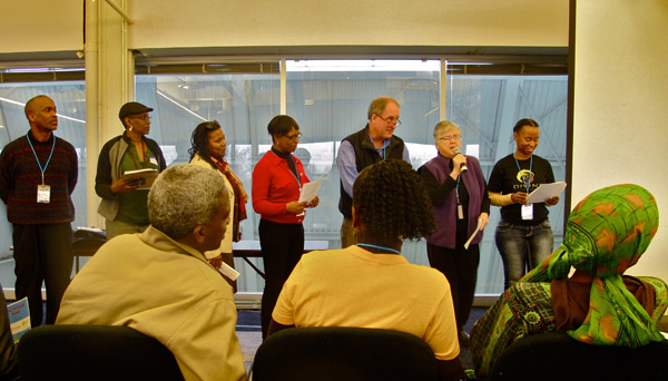 Food justice advocates representing the city's districts introduced their neighborhoods and called upon the audience to represent their place in the city.