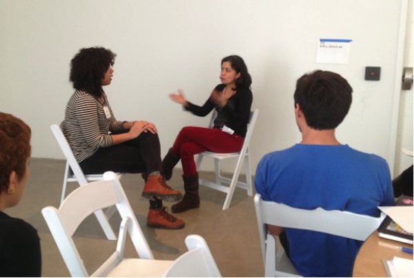 Spanish-language workshop participants discuss strategies for advancing their careers