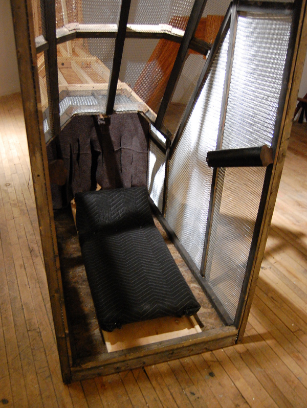 A bed on tracks allows visitors a chance to glide into the structure.