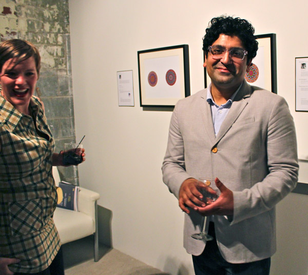 Khan (right), with artist Megan Heeres on the left.