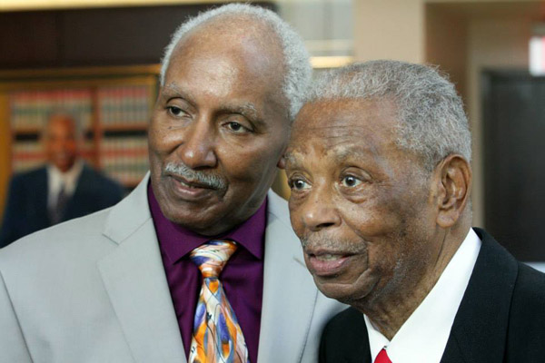 Artist Lester Johnson (left) and Damon J. Keith (right) at the opening ceremony. Photo courtesy of the Wayne State University School of Law.