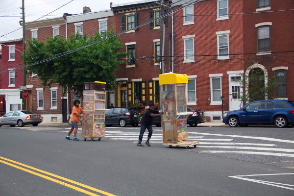 Martinez and Johnston roll their structures across town to Asian Arts Initiative. Photo by Linda Fernandez
