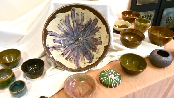 One of Goodman's smashing (and sink-smashing) creations (Chicory bowl, center), on display at the studio shop.