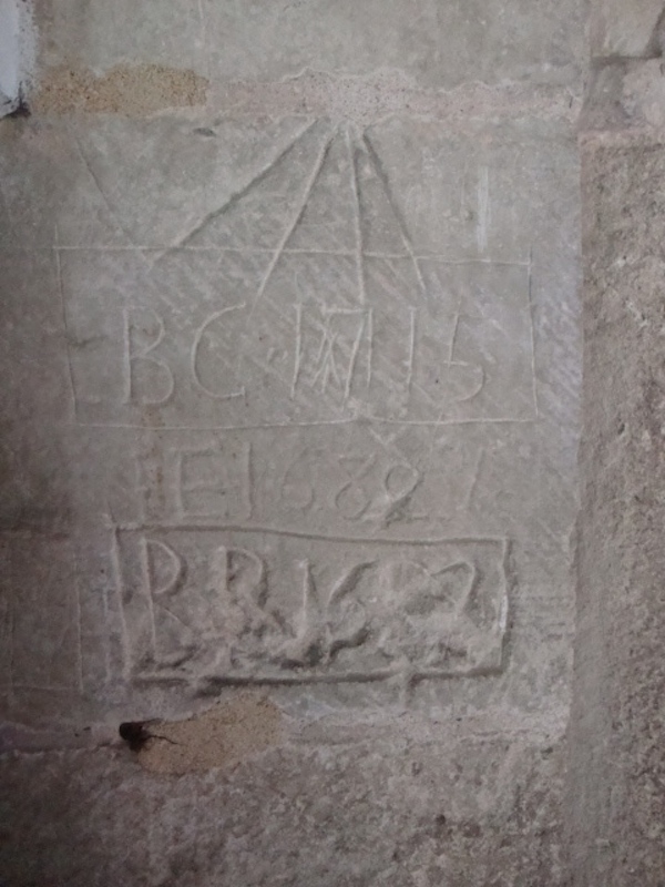 Even in 1682, people felt the need to graffiti things… Entrance to St Nicholas’ Church, Bishops Sutton, UK. Photo: Liz Shannon 