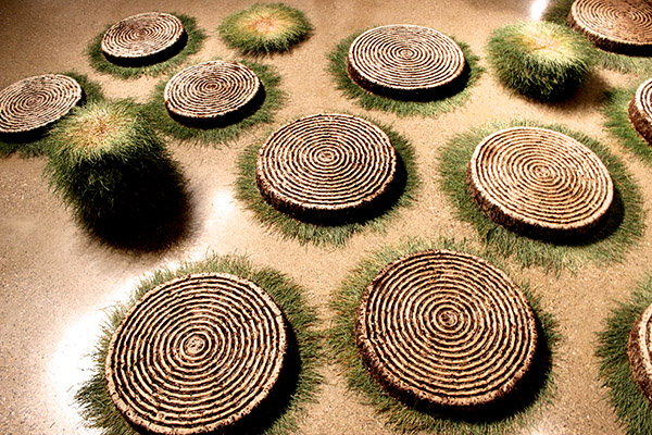 The turf arrangements that are the earth element in Cambell's installation.