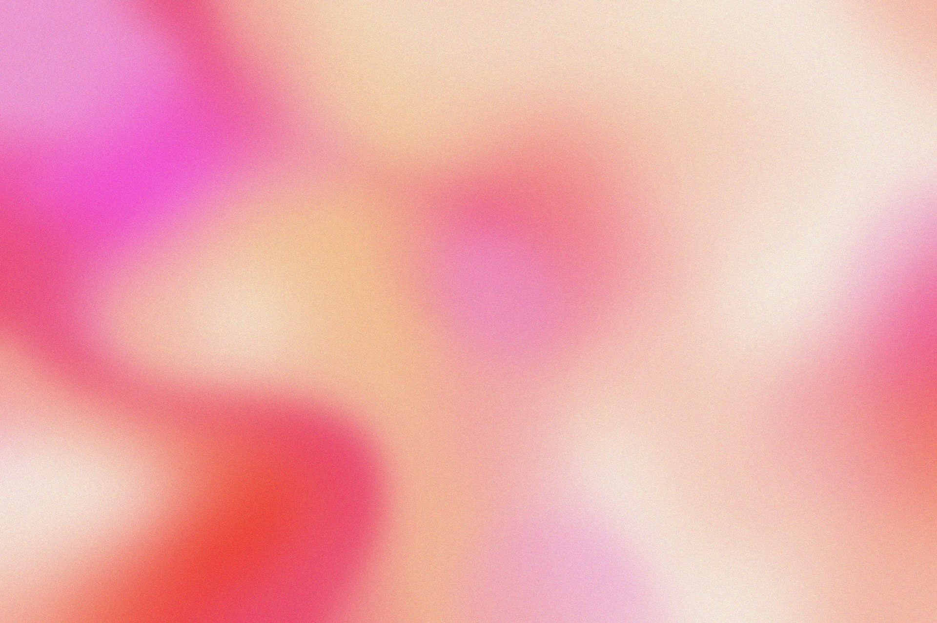 Abstract gradient featuring pink and yellow hues.
