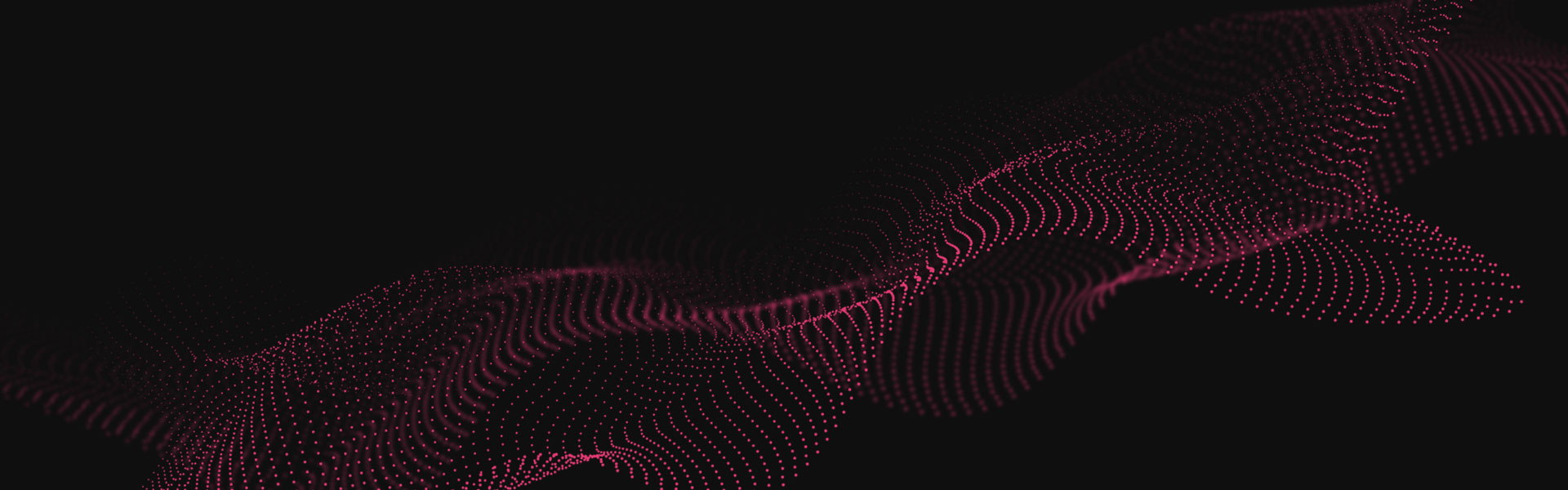 Abstract image featuring a wave of particles. The background is very dark - almost black - and the particles are magenta.